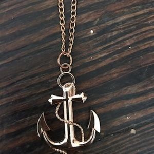 Faux gold necklace of anchor cross